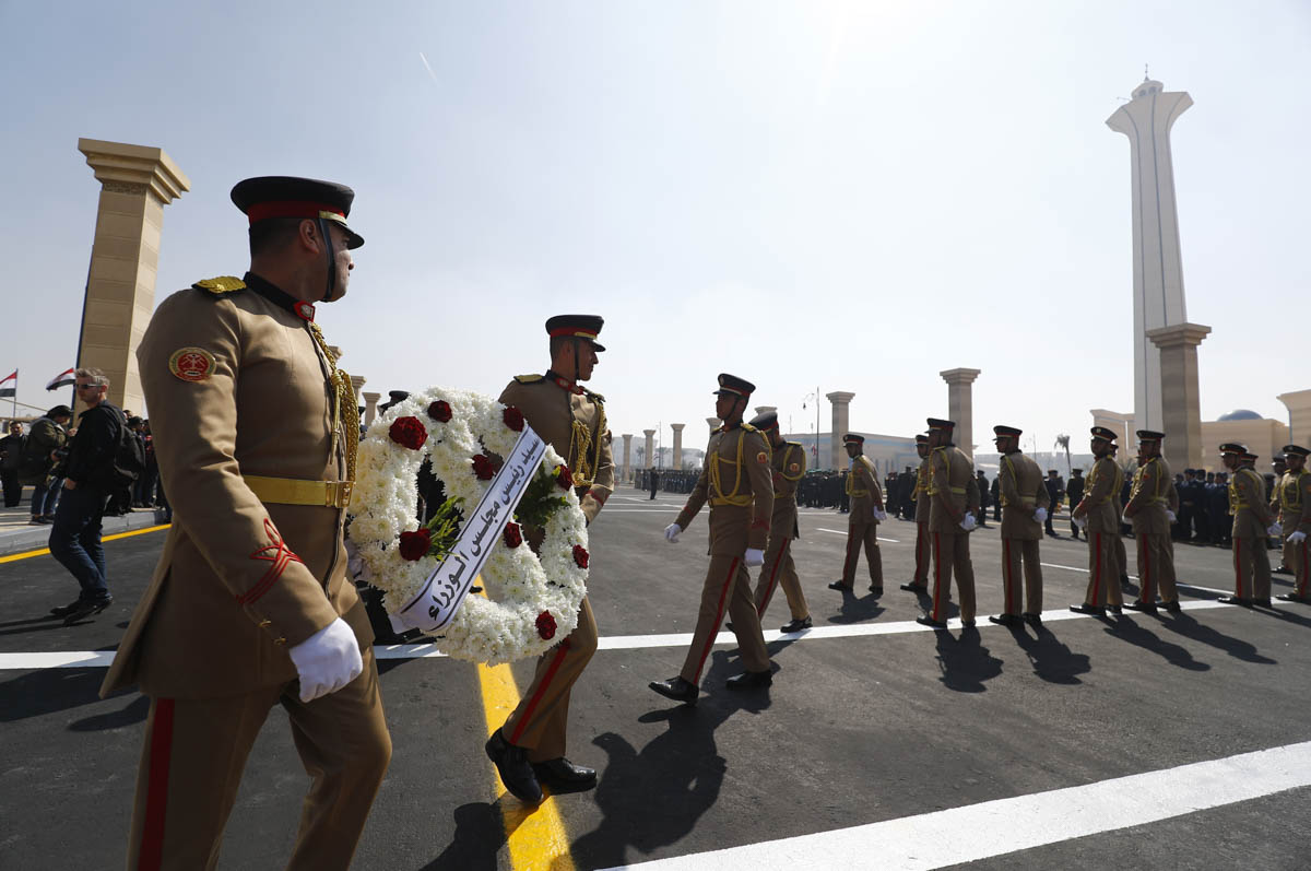 Egyptian guards carry a wreath honouring Egypt''s former president Hosni Mubarak outside Cairo''s Mosheer Tantawy mosque in the eastern outskirts of the Egyptian capital on February 26, 2020. - Mubarak,