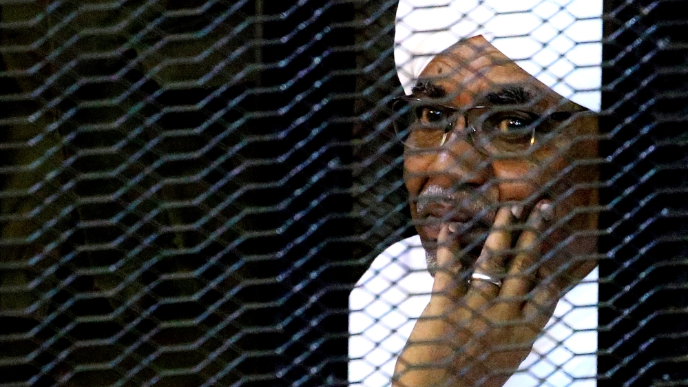 Sudan''s former president Omar Hassan al-Bashir sits inside a cage at the courthouse where he is facing corruption charges, in Khartoum, Sudan September 28, 2019. REUTERS/Mohamed Nureldin Abdallah