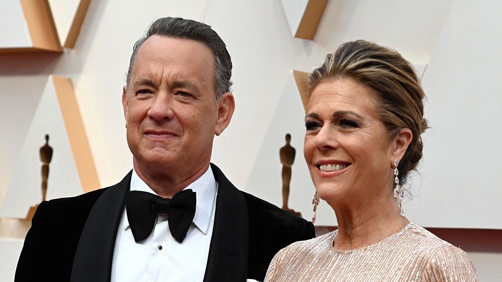 (FILES) In this file photo US actor Tom Hanks and wife Rita Wilson arrive for the 92nd Oscars at the Dolby Theatre in Hollywood, California on February 9, 2020. - Tom Hanks and his wife Rita Wilson ha