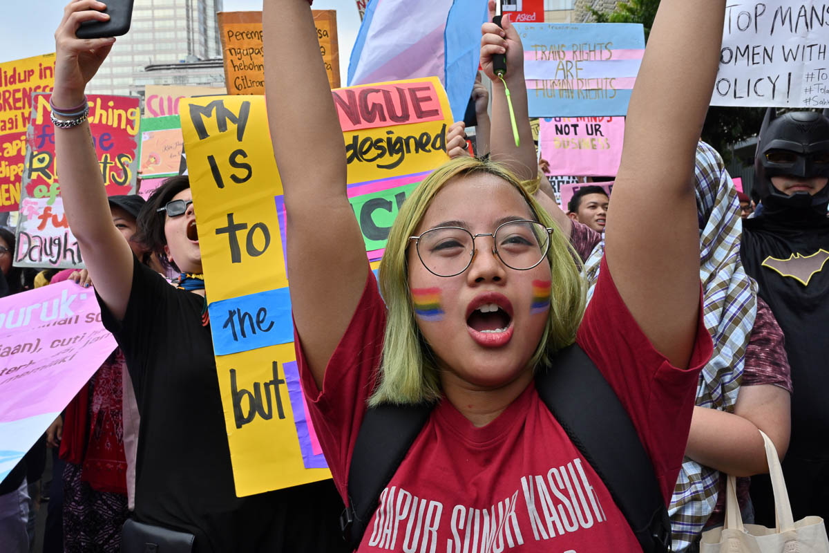 Indonesian people march to mark the International Womeni´s Day in Jakarta on March 8, 2020. (Photo by ADEK BERRY / AFP)