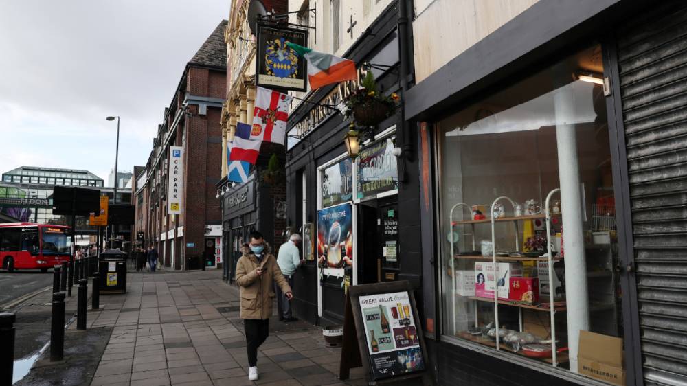 Man outside pub - Reuters