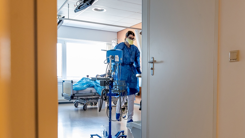 A medical staffer works in a special department set up for patients suspected of being infected with COVID-19, the new coronavirus, at the Zuyderland Medical Centre in Heerlen, on March 14, 2020. - To
