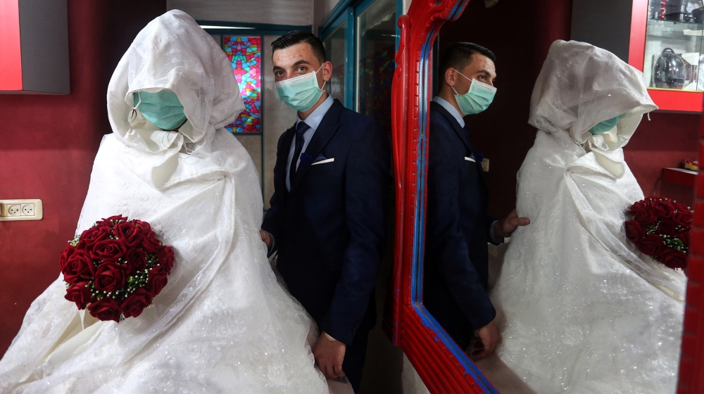Coronavirus wedding story [Hana Salah/Al Jazeera]