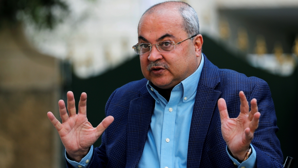 Arab politician Ahmad Tibi, of the Joint List party, gestures during his interview with Reuters at his house in East Jerusalem