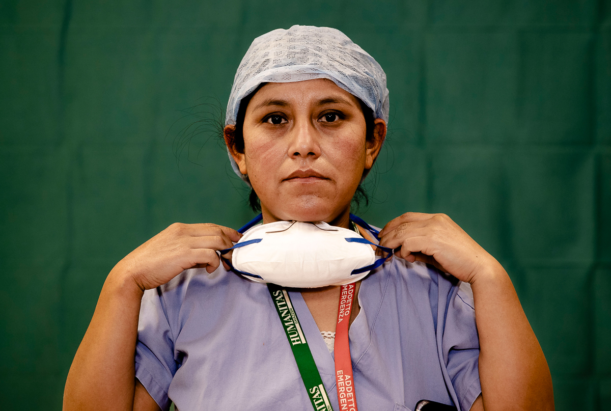 Ana Travezano, 39, a nurse at the Humanitas Gavazzeni Hospital in Bergamo, Italy poses for a portrait at the end of her shift Friday, March 27, 2020. The intensive care doctors and nurses on the front