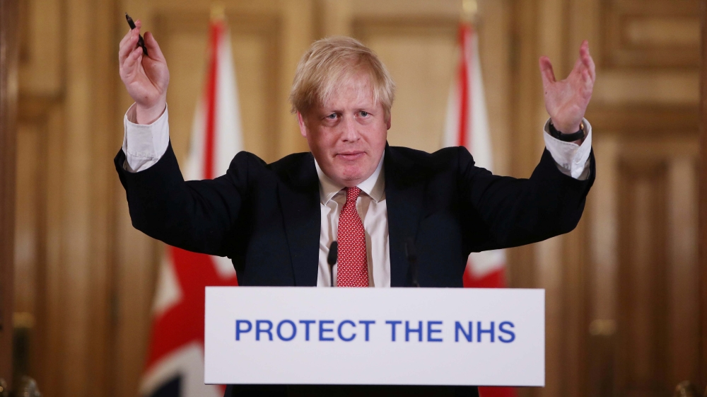 British PM Johnson gives daily address to nation on coronavirus in London