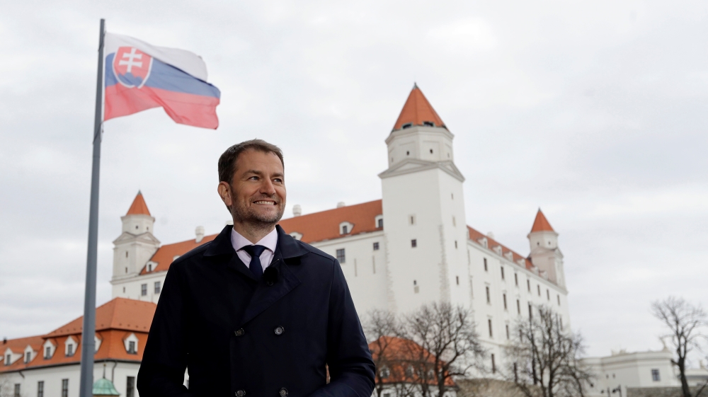 Igor Matovic, leader of The Ordinary People and Independent Personalities, waits in front of the Bratislava Castle for a televised interview
