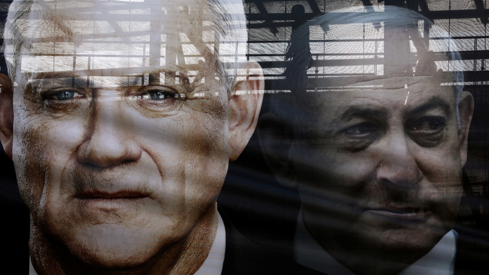 A banner depicts Benny Gantz, leader of Blue and White party, and Israel Prime minister Benjamin Netanyahu, as part of Blue and White party''s campaign ahead of the upcoming election, in Tel Aviv