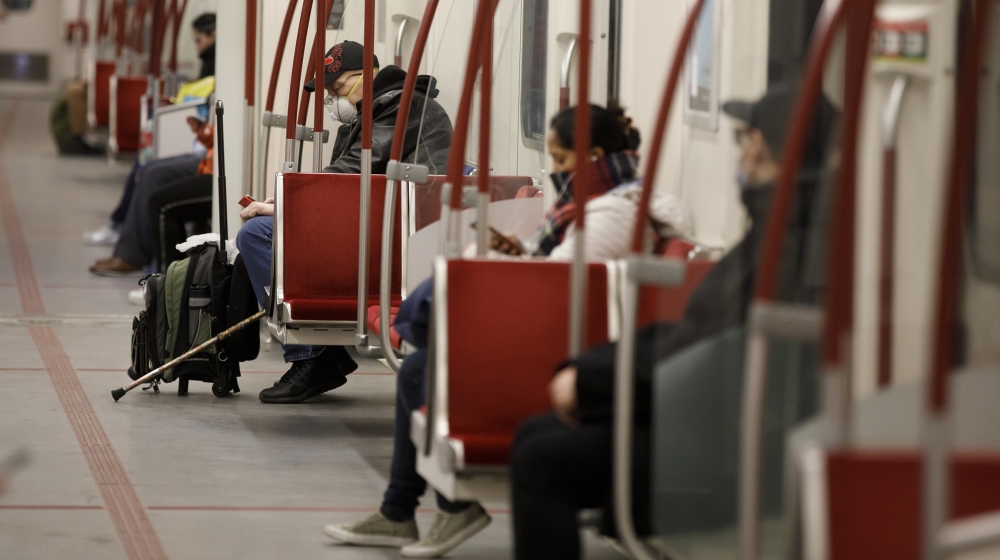 A man is seen wearing a mask in the subway during morning commuting hours as Toronto copes with a shutdown due to the Coronavirus, on April 1, 2020 in Toronto, Canada. Prime Minister Justin Trudeau sa