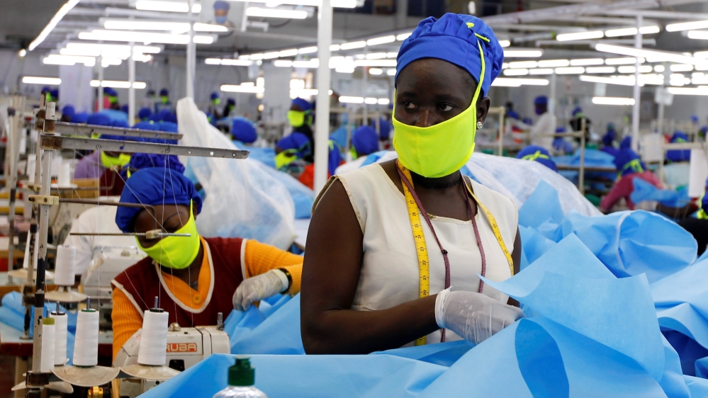 A worker is seen at a production line within the Shona Textiles Export