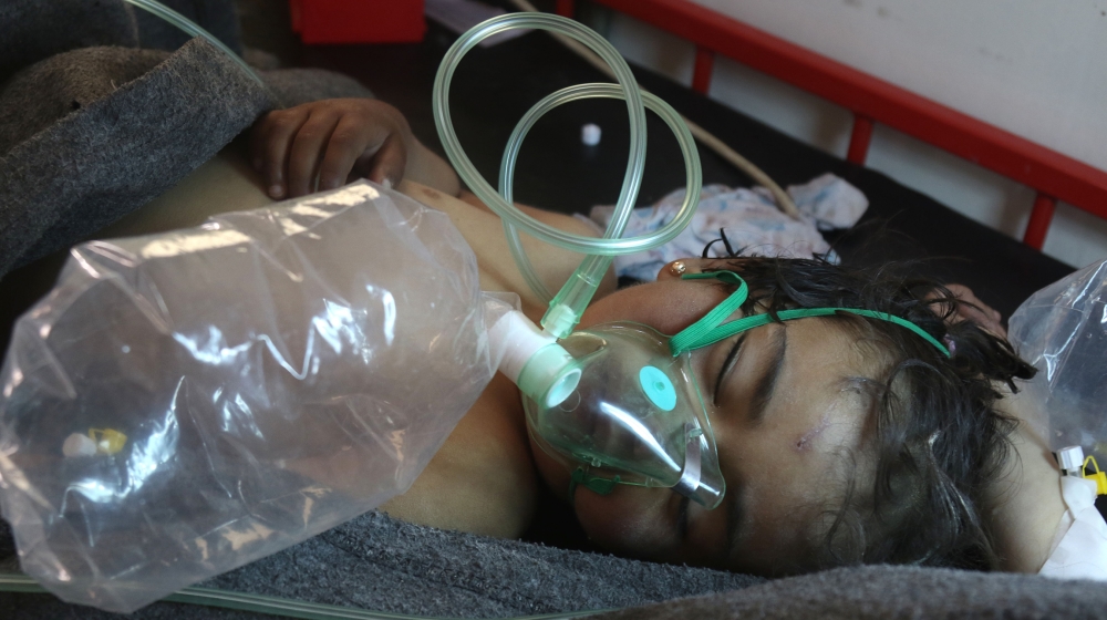 A Syrian child receives treatment at a small hospital in the town of Maaret al-Numan following a suspected toxic gas attack in Khan Sheikhun, a nearby rebel-held town in Syria’s northwestern Idlib pro