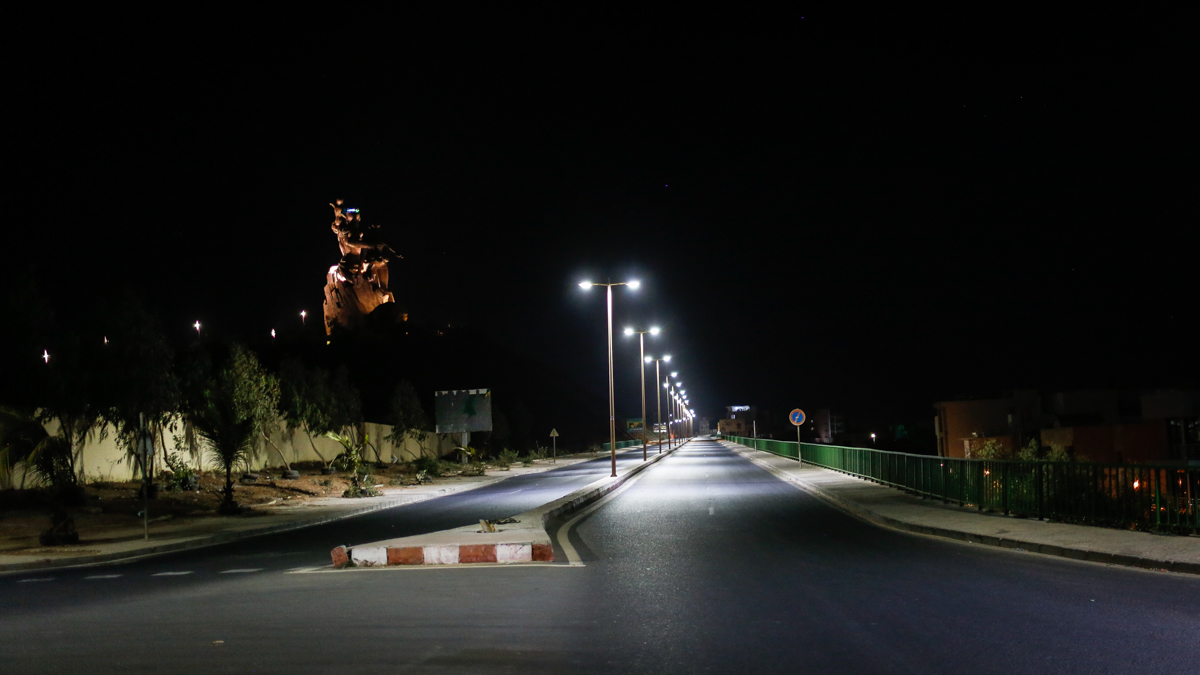 Dakar’s arterial corniche road that skirts the Renaissance Monument is void of cars and people during a nighttime curfew that has been extended to May 4 as a step taken by President Macky Sall to prev