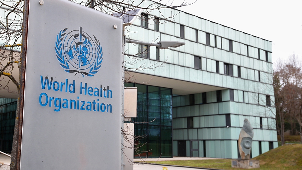 FILE PHOTO: A logo is pictured outside a building of the World Health Organization (WHO) during an executive board meeting on update on the coronavirus outbreak, in Geneva, Switzerland, February 6, 2