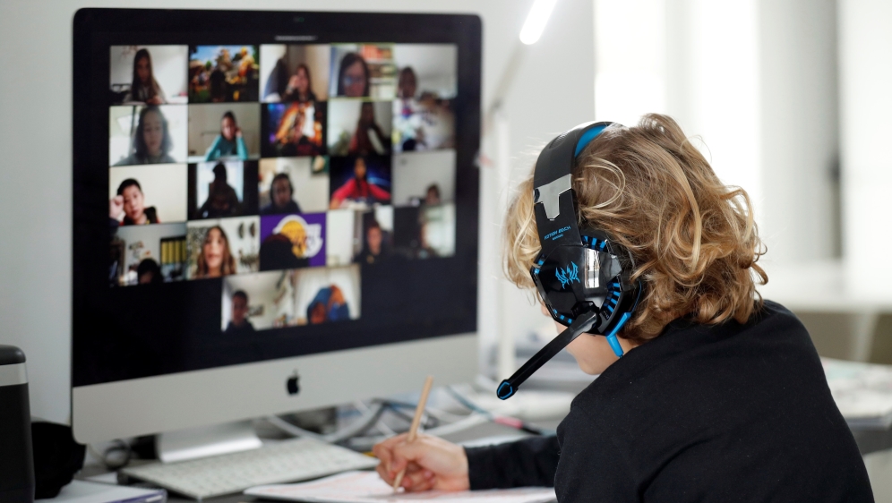 Zoom/ A student takes online classes at home, 