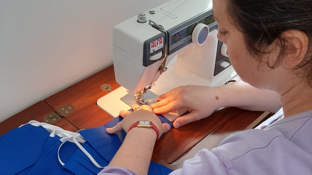 Spain Catholics make masks as they forgo famed Easter processions