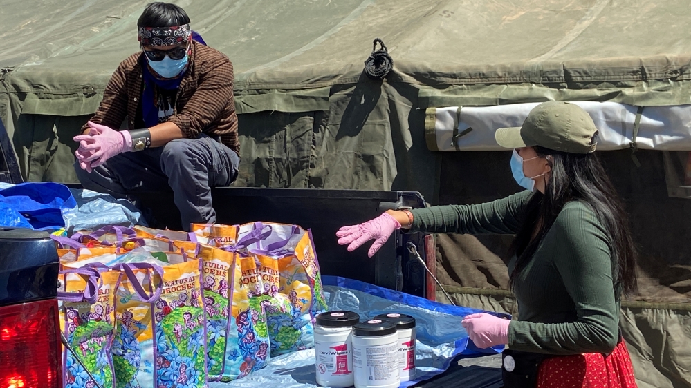 As virus kills Navajos in their homes, tribal women provide lifeline