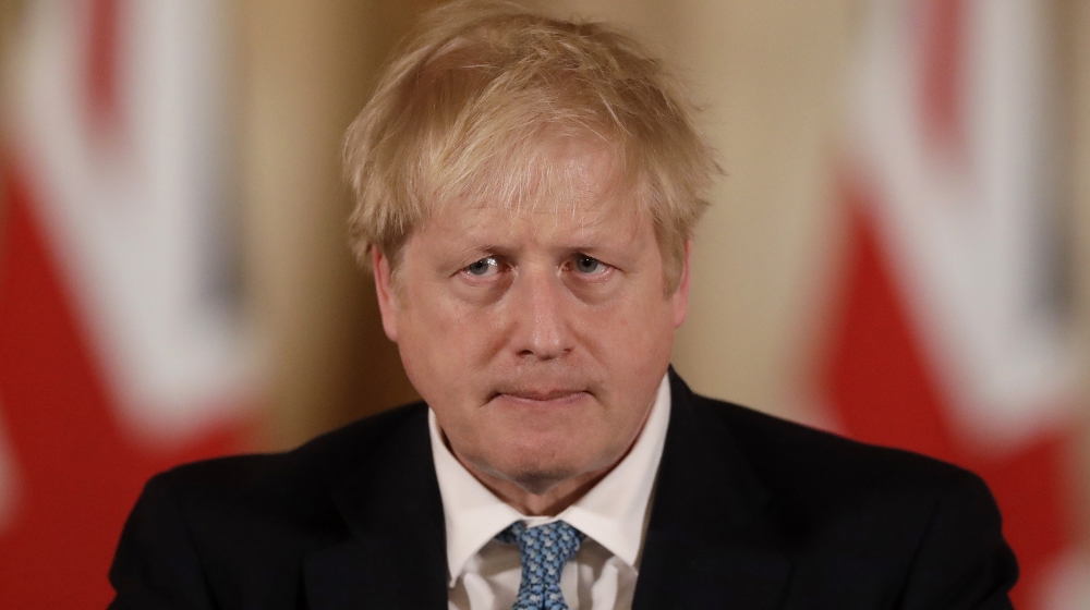 British Prime Minister Boris Johnson gives a press conference about the ongoing situation with the COVID-19 coronavirus outbreak inside 10 Downing Street in London, Tuesday, March 17, 2020. For most p