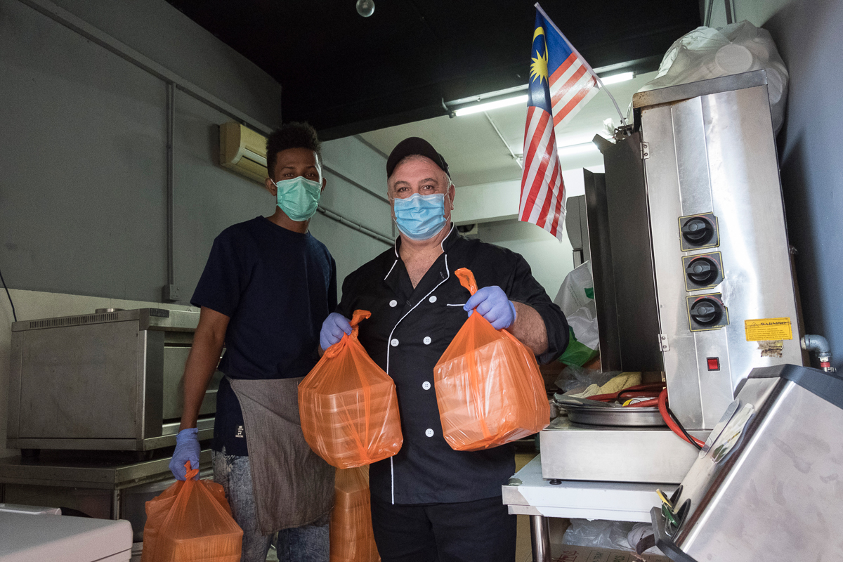 Mahmud (L), 22 years old, from Somalia, has been living in Malaysia for one and a half years. “I am currently a student at a language centre in Kuala Lumpur. I planned to start college this year to st