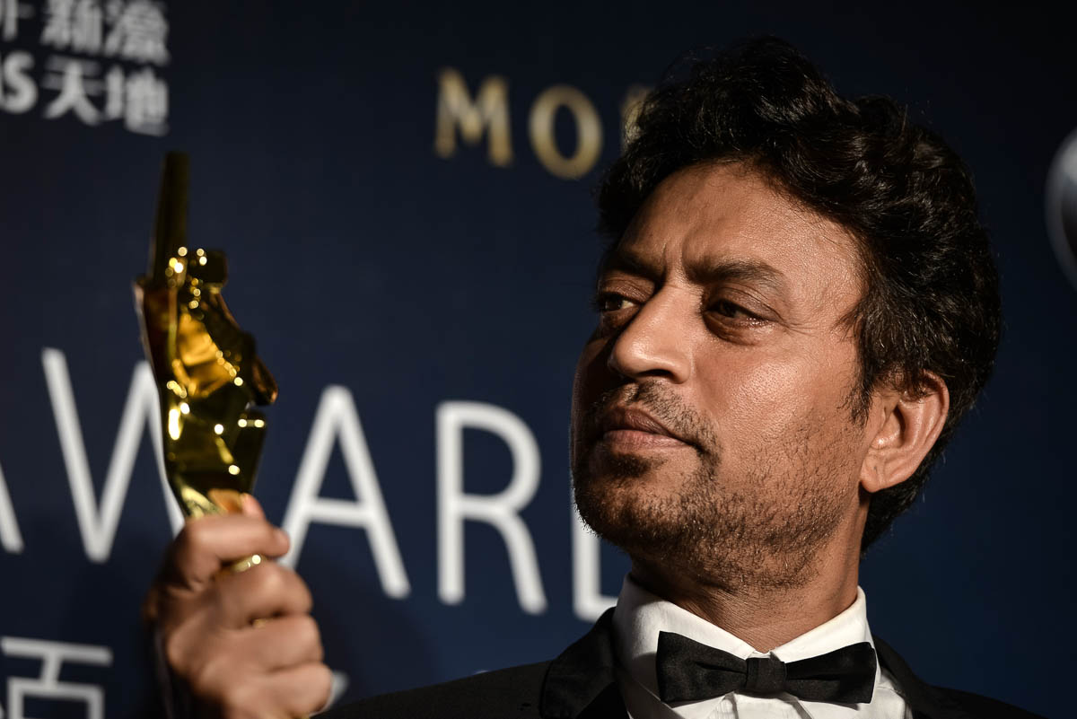 Best actor winner Irrfan Khan of India poses with his trophy during the Asian Film Awards in Macau on March 27, 2014. Movie stars attended the event held annually since 2007, aimed at showcasing the r