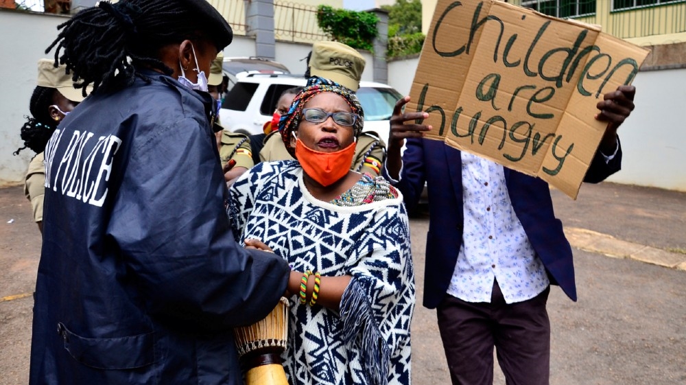 Ugandan academic Stella Nyanzi and activists protest against the way that government distributes the relief food and the lockdown situation to control the spread of
