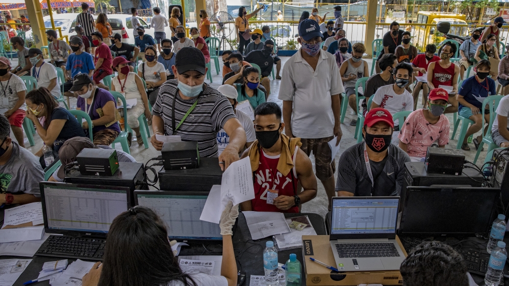 Filipinos Provide Government Giveaways Amid The Coronavirus Pandemic