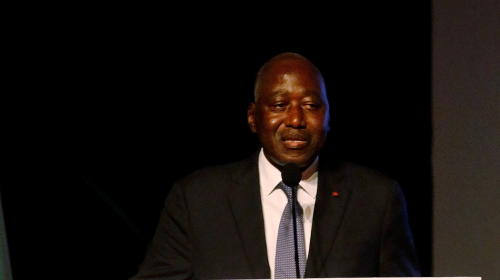 Prime Minister Gon Coulibaly speaks after he was named presidential candidate for RHDP during the party meeting in Abidjan