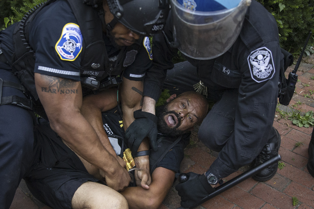 WASHINGTON, DC - JUNE 22: Protesters clash with U.S. Park Police after protesters attempted to pull down the statue of Andrew Jackson in Lafayette Square near the White House on June 22, 2020 in Washi