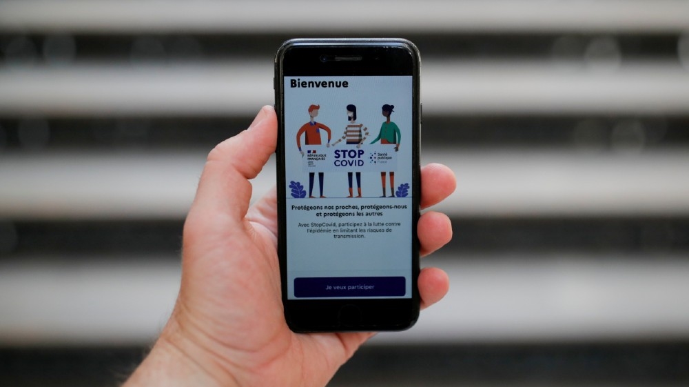FILE PHOTO: A screenshot showing the tracking application StopCovid is seen on a mobile phone in this illustration picture taken in Nantes, France June 2, 2020. REUTERS/Stephane Mahe