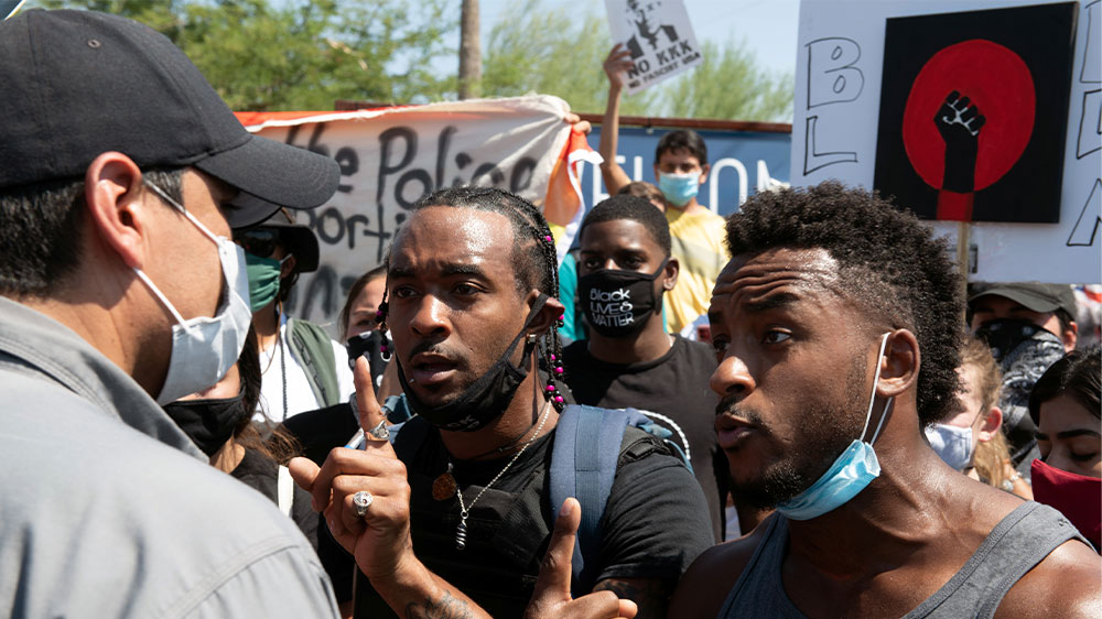 Trump protesters confront police