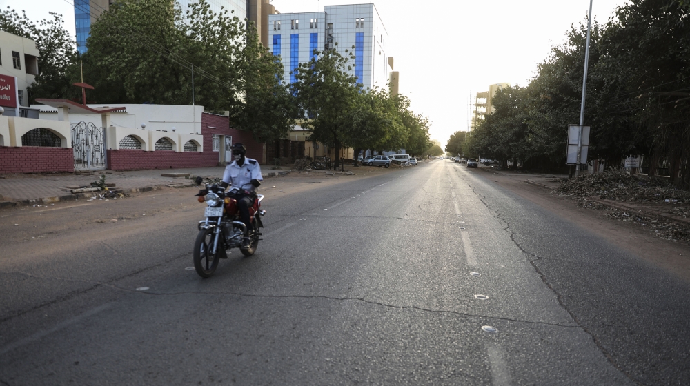An empty avenue is seen in Khartoum , Sudan, Tuesday, March 24, 2020 as Sudanese government ordered a nighttime curfew to prevent the spread of the coronavirus. (AP Photo/Marwan Ali)