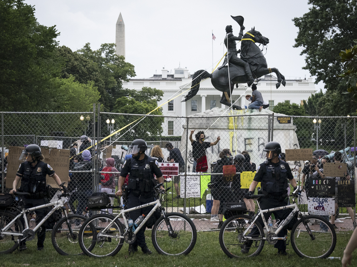 WASHINGTON, DC - JUNE 22: Protesters attempt to pull down the statue of Andrew Jackson in Lafayette Square near the White House on June 22, 2020 in Washington, DC. Protests continue around the country