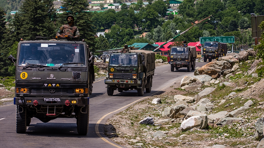 GAGANGIR, KASHMIR, INDIA - JUNE 19: An Indian army convoy drives towards Leh, on a highway bordering China, on June 19, 2020 in Gagangir, India. As many as 20 Indian soldiers were killed in a "violent