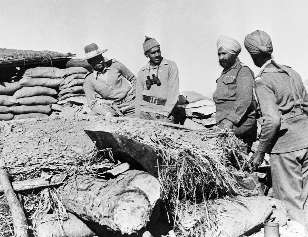 Indian officers occupying a fort on the Ladakh border during the war between India and China, 1962. (Photo by ¬© Hulton-Deutsch Collection/CORBIS/Corbis via Getty Images)