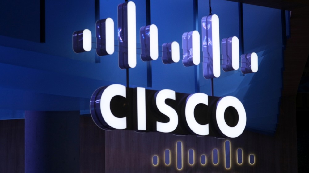 FILE PHOTO: The Cisco logo is seen at their booth at the Mobile World Congress in Barcelona, Spain, February 26, 2018. REUTERS/Sergio Perez/File Photo