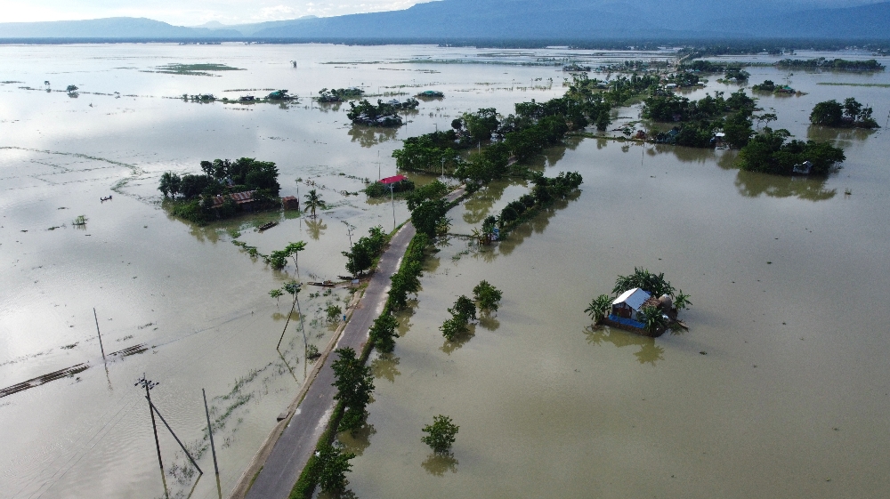 BANGLADESH-INDIA-NEPAL-WEATHER-FLOOD In this aerial photo inundated houses are seen in Sunamgong on July 14, 2020. Almost four million people have been hit by monsoon floods in South Asia