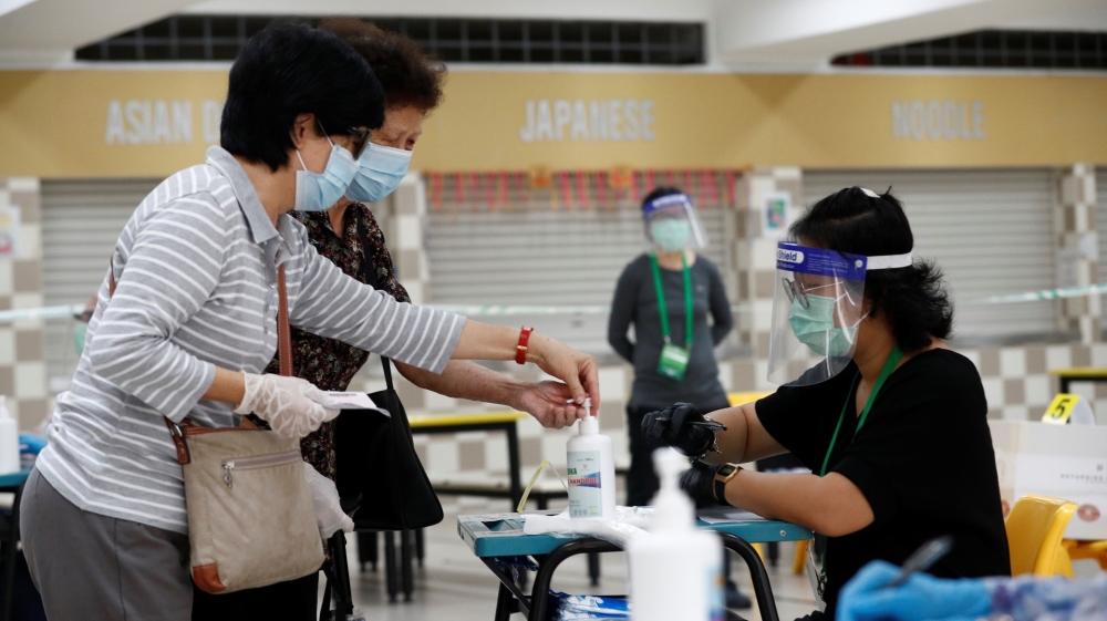 People vote in Singapore's general election amid Covid-19