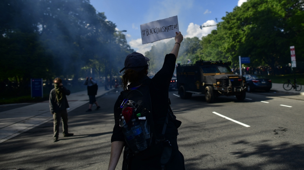 PHILADELPHIA, PA - JUNE 01: A protester holds a sign stating 