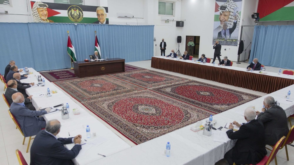 Palestinian President Mahmoud Abbas heads a leadership meeting at his headquarters, in the West Bank city of Ramallah, Thursday, May 7, 2020. (AP Photo/Nasser Nasser, Pool)