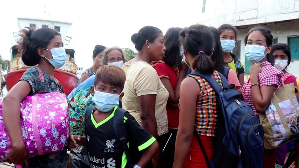 People who fled from Rathedaung Township arrive in Sittwe, the capital of Rakhine State