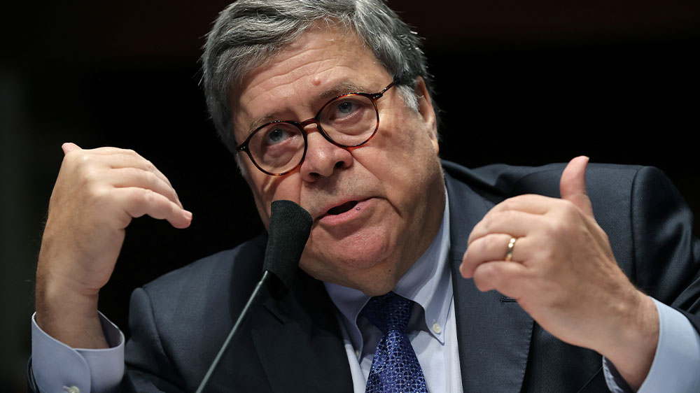 William Barr gestures