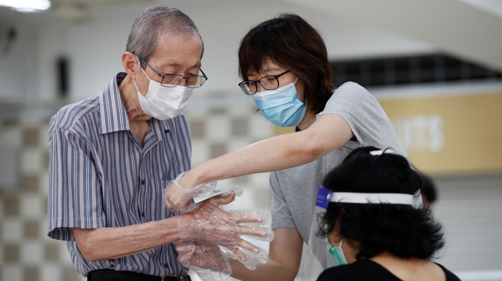 People vote in Singapore's general election amid Covid-19