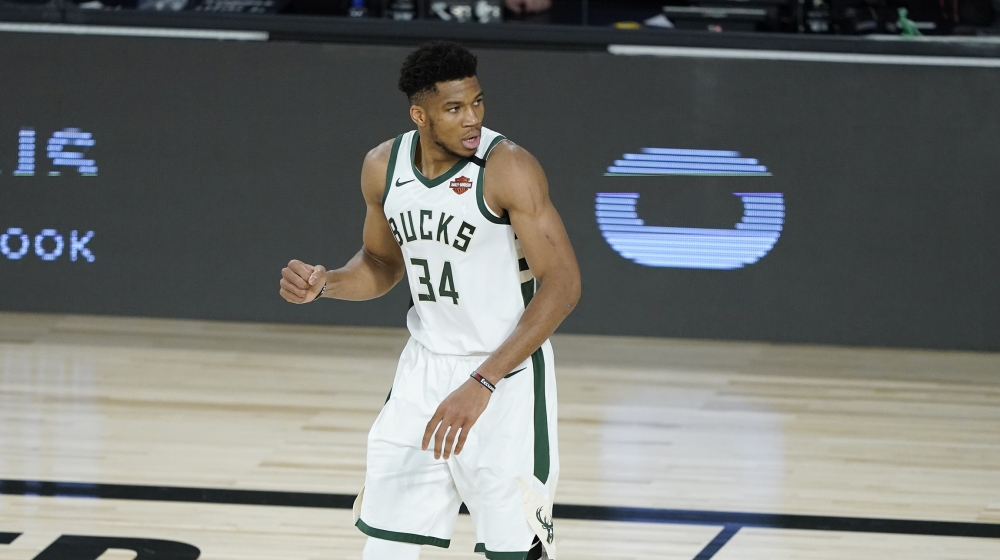 Milwaukee Bucks' Giannis Antetokounmpo reacts during the second half of an NBA basketball first round playoff game against the Orlando Magic Monday, Aug. 24, 2020, in Lake Buena Vista, Fla. (AP Photo