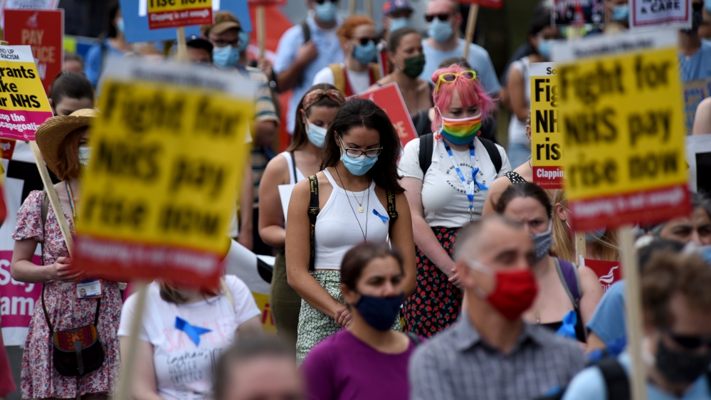 Nurses and other frontline NHS workers stage a protest in London