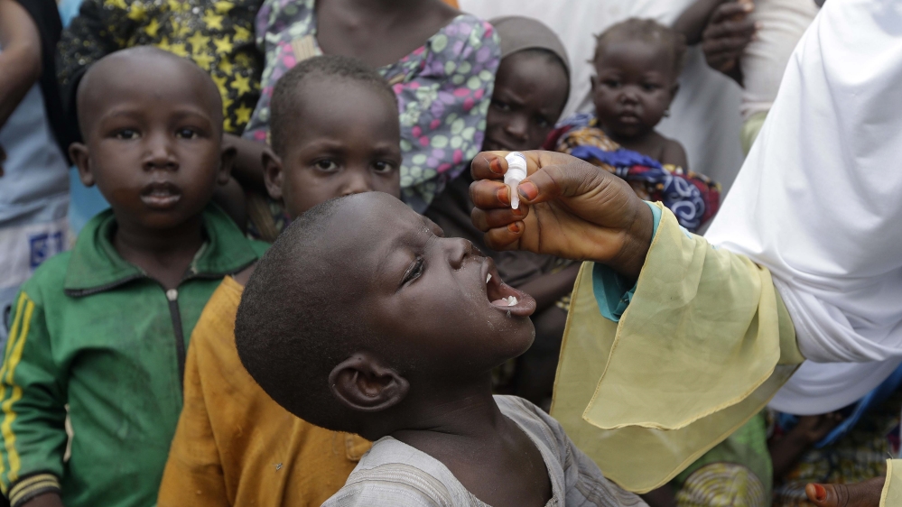 In this photo taken on Sunday, Aug. 28, 2016, a health official