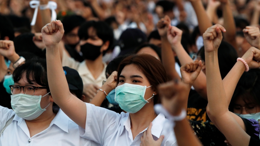 Students show support for the student-led democracy movement outside the Education Ministry in Bangkok