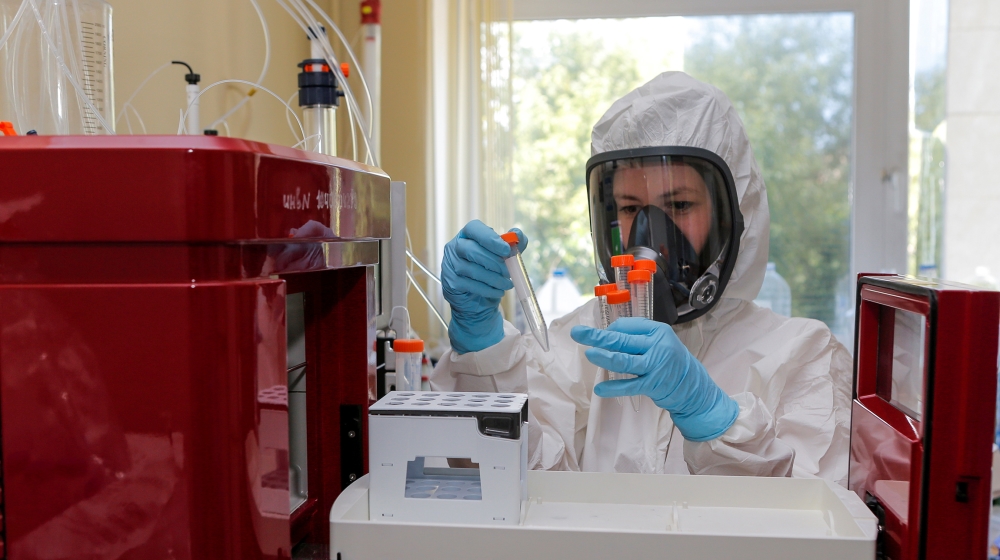 A scientist works inside a laboratory of the Gamaleya Research Institute of Epidemiology and Microbiology during the production and laboratory testing of a vaccine against the coronavirus disease (COV