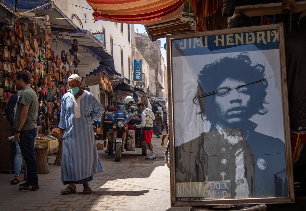 A picture taken in the Moroccan coastal city of Essaouira shows portraits of late US guitarist Jimi Hendrix on September 10, 2020. - Some claim to have seen him, others to have spoken with him -- 50 y