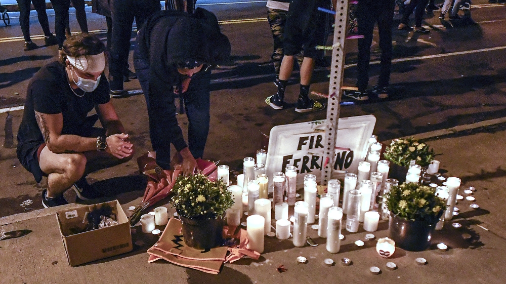 A makeshift memorial is set up, Wednesday, Sept. 2, 2020, in Rochester, N.Y., near the site where Daniel Prude was restrained by police officers. Prude, a Black man who had run naked through the stree