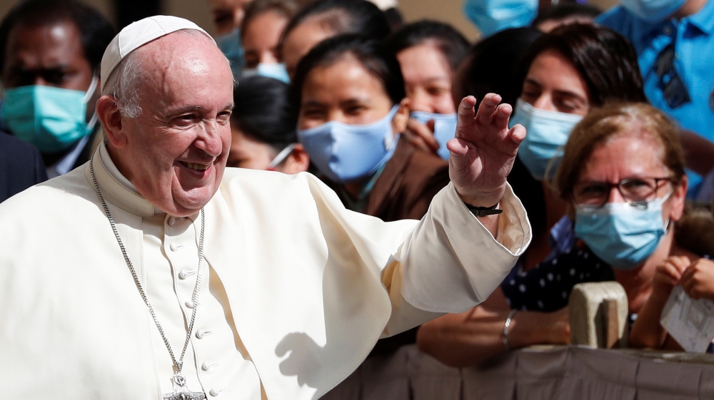 Pope Francis leaves after the first weekly general audience to readmit the public since the coronavirus disease (COVID-19) outbreak, at the Vatican