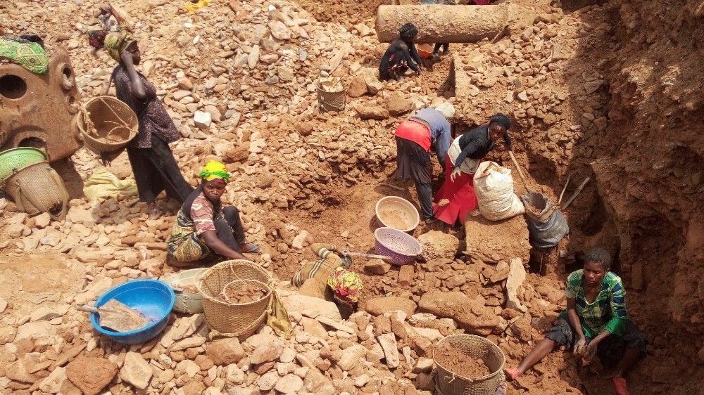 Congolese miners work at an artisanal gold mine near Kamituga